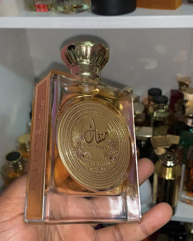 عطر ادوپرفیوم ارض الزعفران مدل مثقال رایحه شیرین ۱۰۰ میلیلیتر شرکتی
